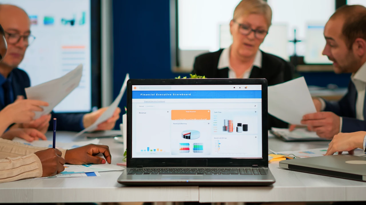 optimized-image Busy multicultural employees from saas marketing agencies analyzing saas marketing solutions.